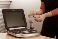 Apply adhesive-pad inside cover directly to ultrasound probe without gel
